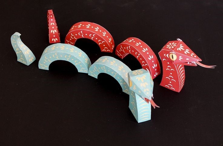 Paper snake toy in the style of Chinese zodiac animals.