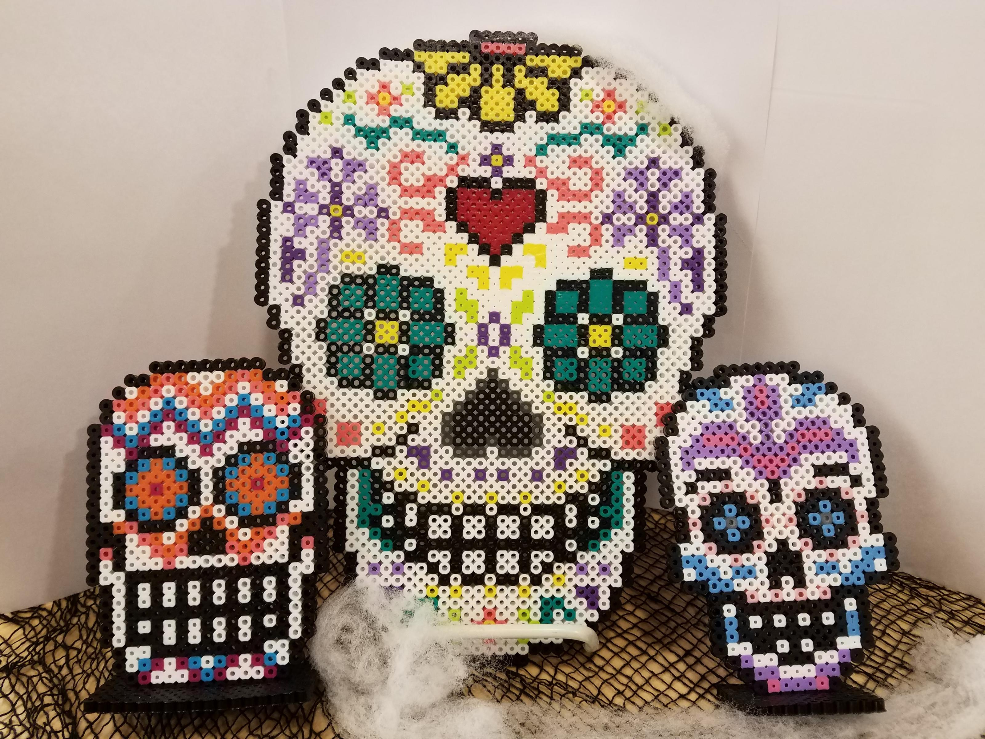 pixel art sugar skulls